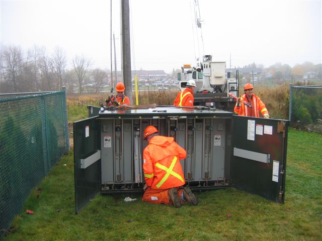 Preparing to make the High Voltage Elbow and grounding connections at the new PME unit. Upon completion we removed our grounds, surrendered the work permit and then re-energizing the equipment. Everything went without a hitch.
